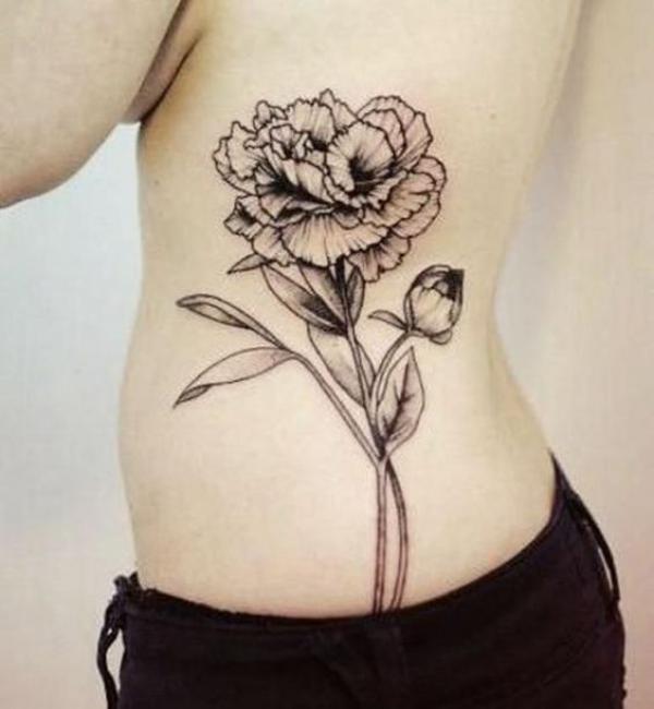 Black and grey carnation side tattoo