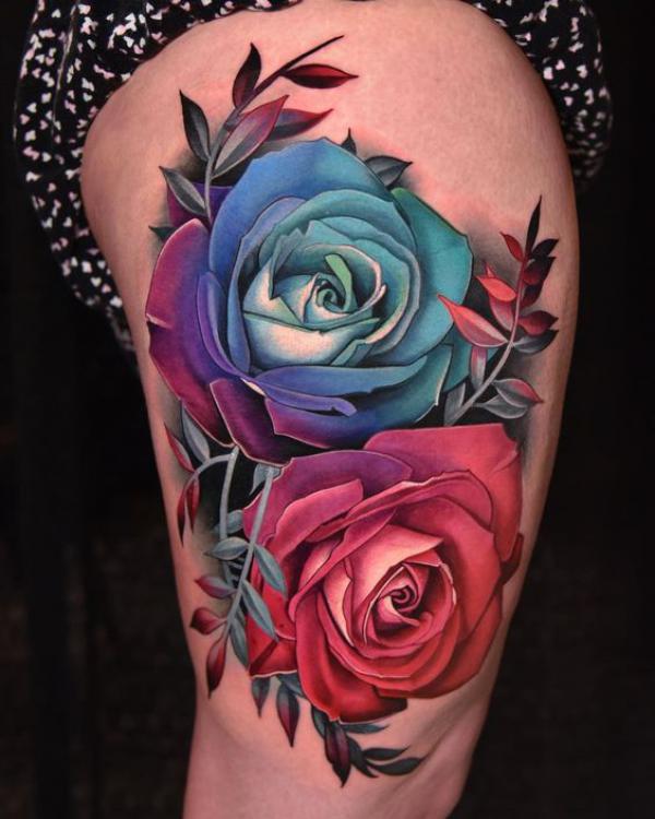 Blue and red roses thigh tattoo