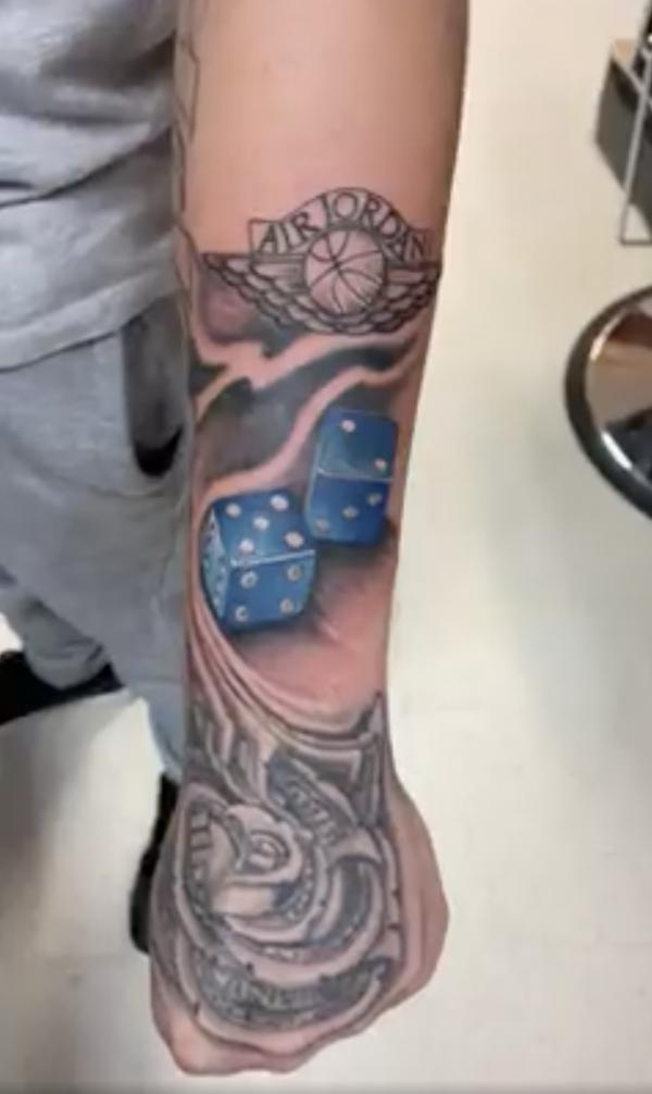 Blue dices and money rose tattoo