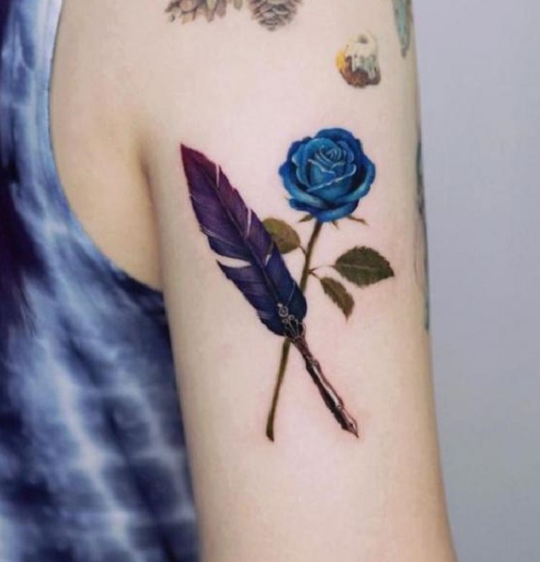 Blue rose and a feather