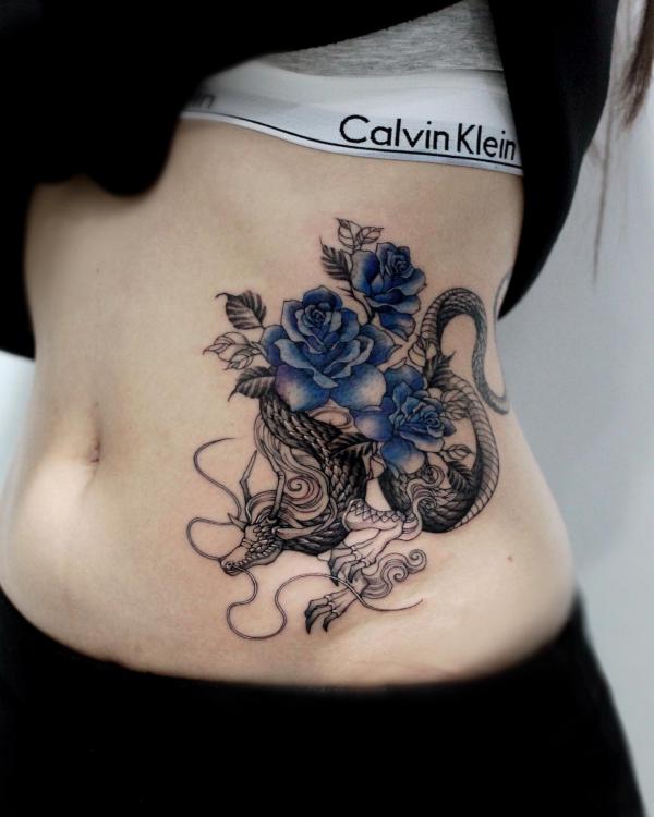 Blue rose and dragon tattoo