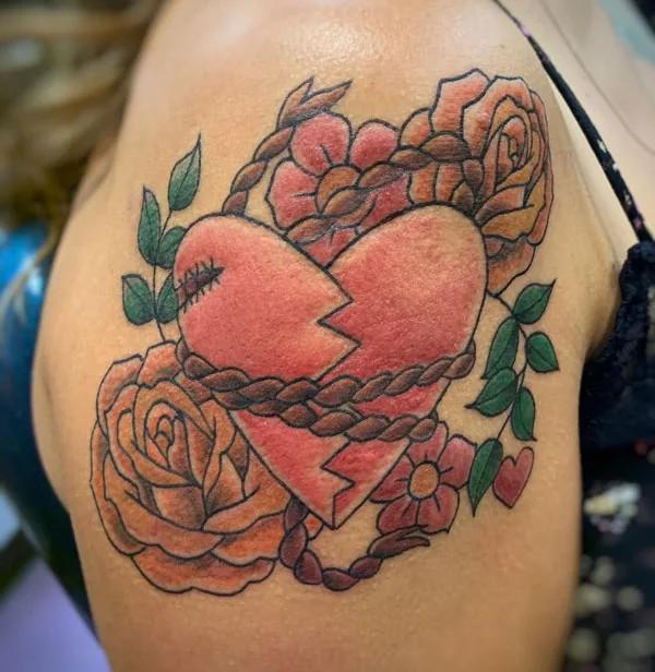 Broken heart and roses shoulder tattoo