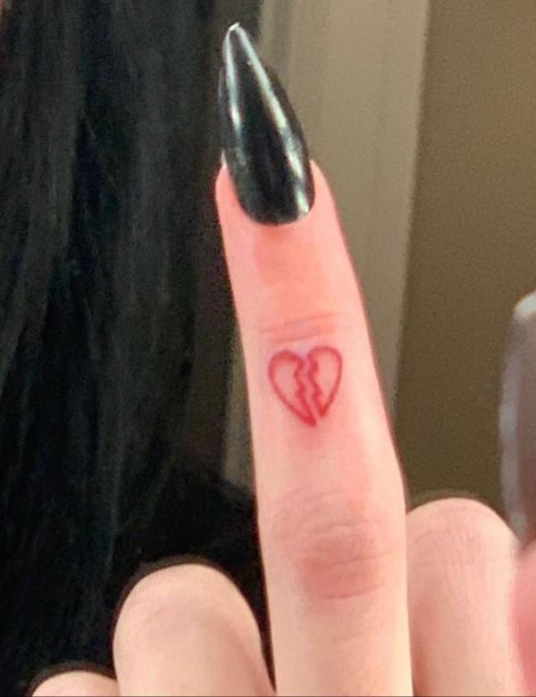 Broken heart finger tattoo