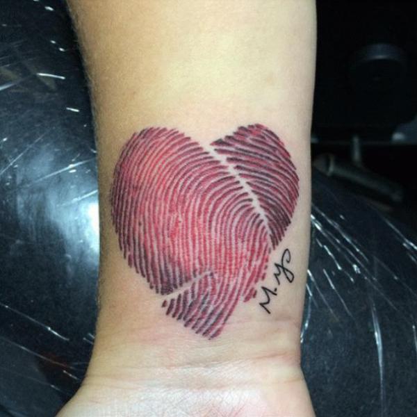 Broken heart fingerprint tattoo