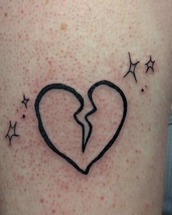Broken heart outline with stars tattoo