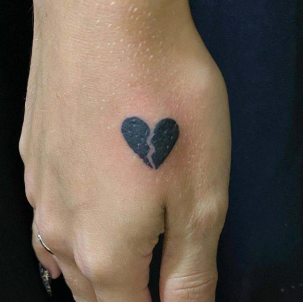 Broken heart thenar web space tattoo