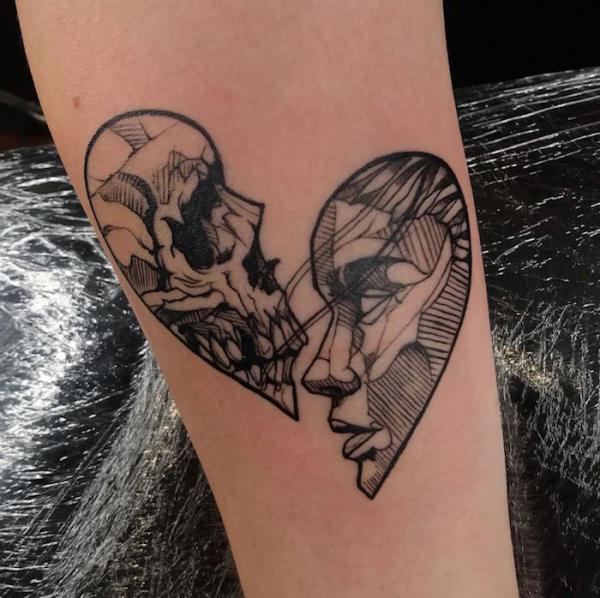 Broken heart with skull tattoo