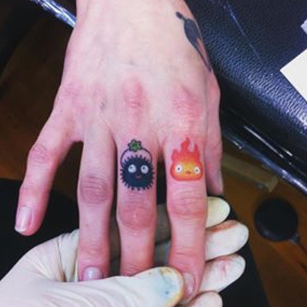 Calcifer and Soot Sprite finger tattoo