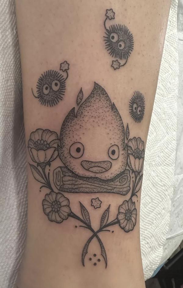 Calcifer and Susuwatari with flowers tattoo black and grey