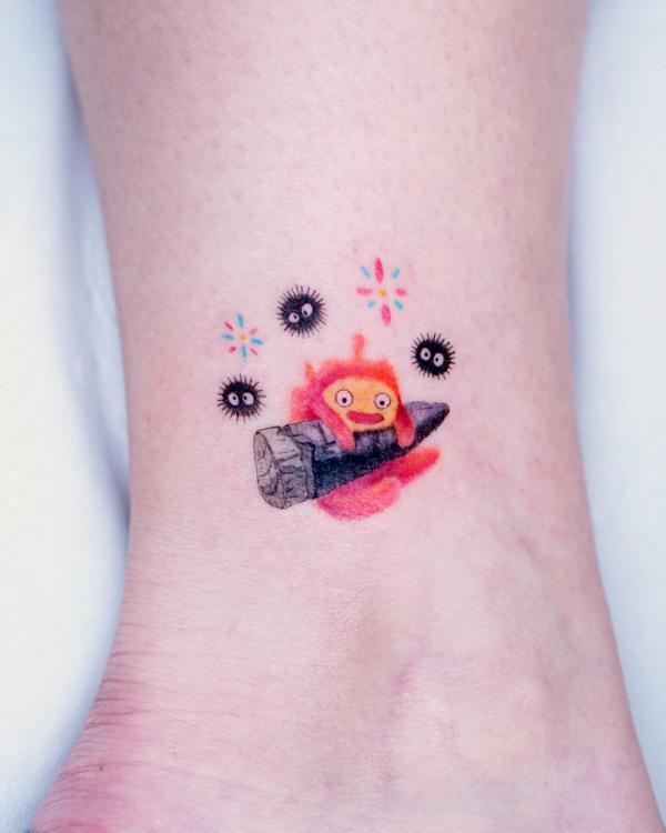 Calcifer and Susuwatari with stars tattoo on ankle