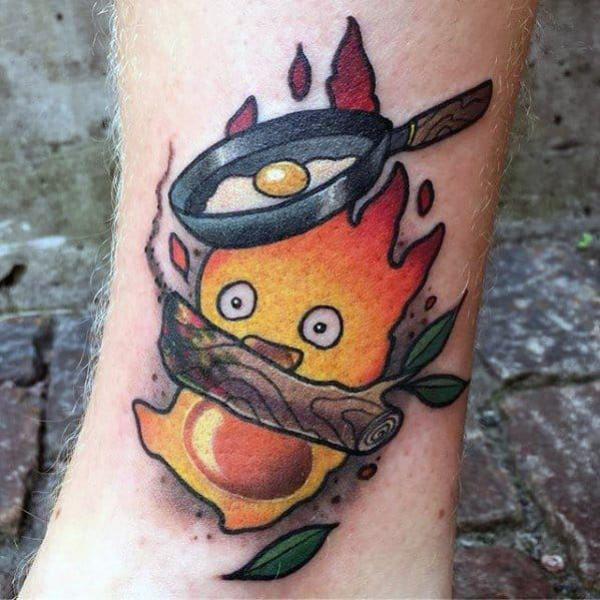 Calcifer heating a pan frying egg tattoo