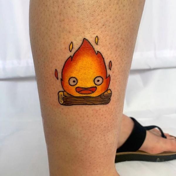 Calcifer tattoo on lower leg