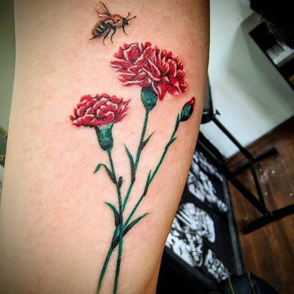 Carnation and bee tattoo