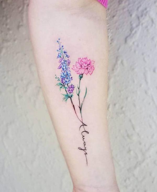 Carnation and larkspur tattoo