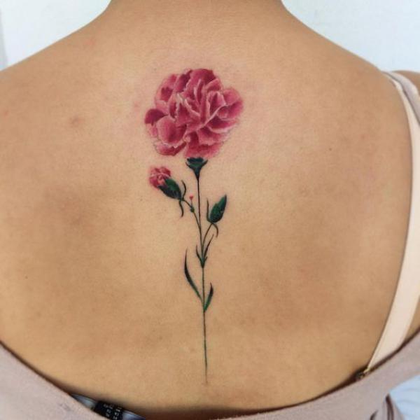 Carnation back tattoo