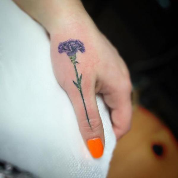 Carnation finger tattoo