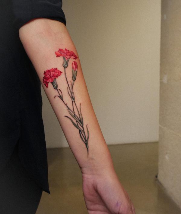 Carnation inner forearm tattoo