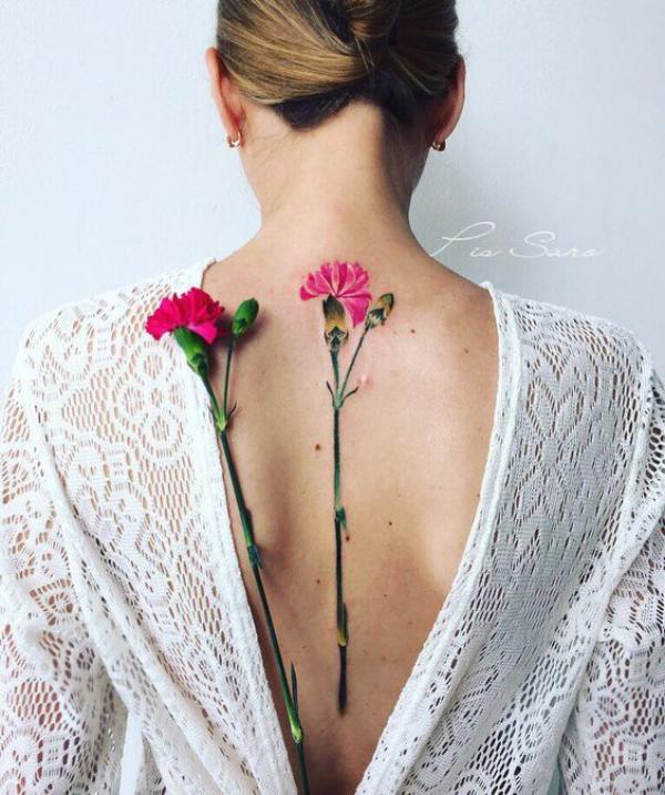 Carnation spine tattoo