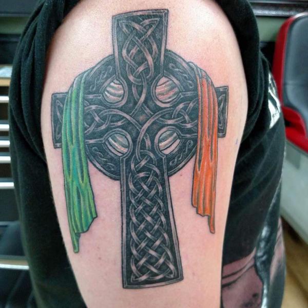 Celtic cross with Irish flag tattoo on upper arm 1