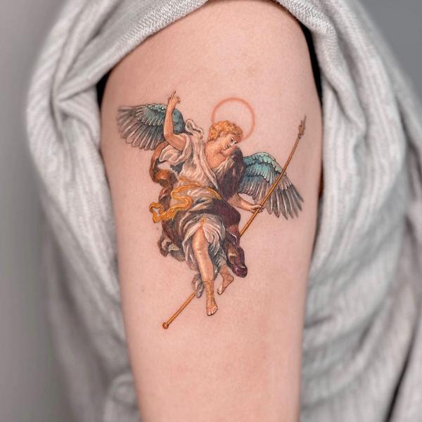 Colored Saint Gabriel cristian upper arm tattoo