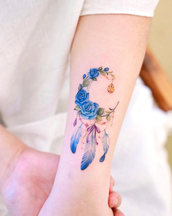 Crescent moon dream catcher with blue roses