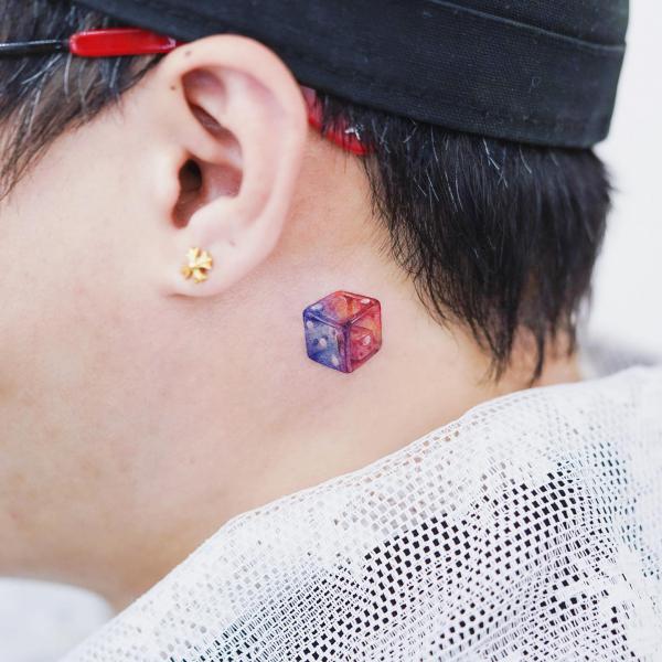Cute dice tattoo behind the ear