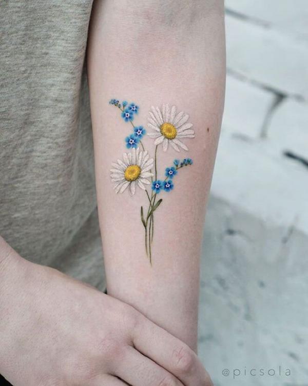 Daisy and forget me not tattoo