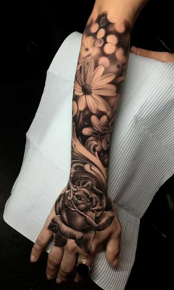 Daisy and rose forearm tattoo for women