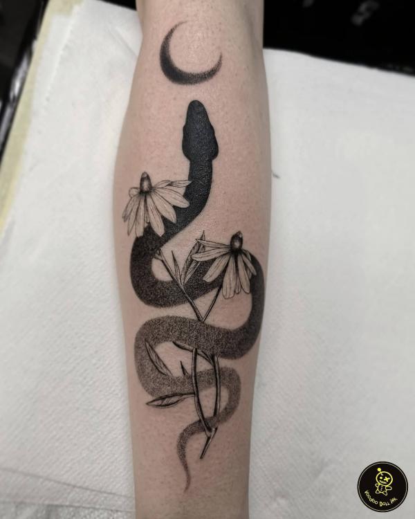 Daisy and snake dotwork under moon