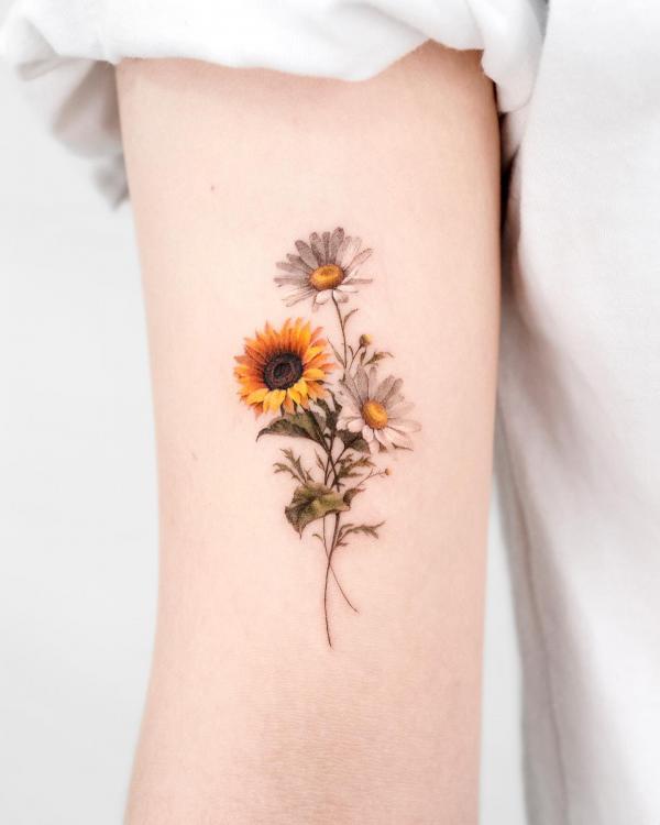 Daisy and sunflower tattoo