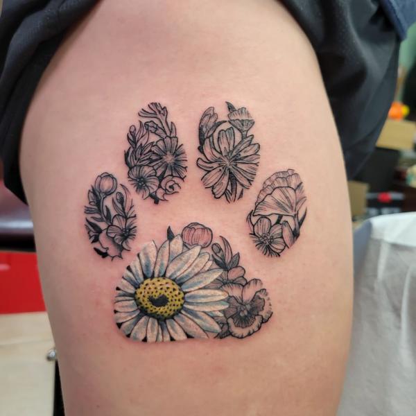Daisy flowers paw print tattoo