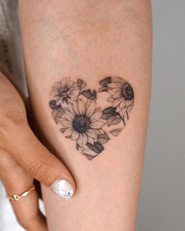 Daisy heart tattoo