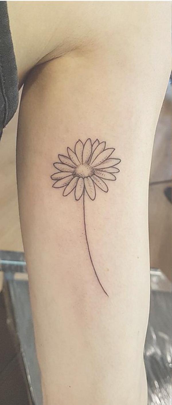 Daisy outline tattoo