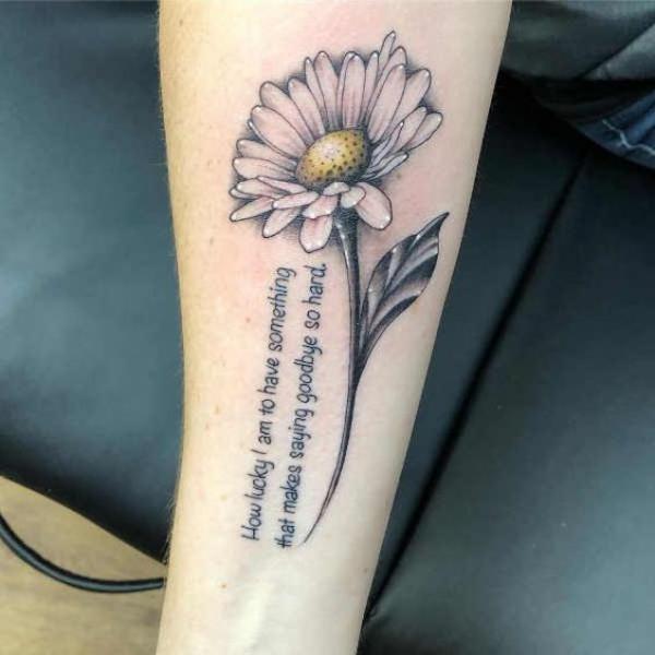Daisy tattoo with quote
