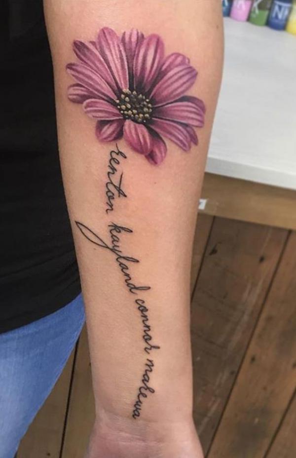 Daisy tattoo with words as stem