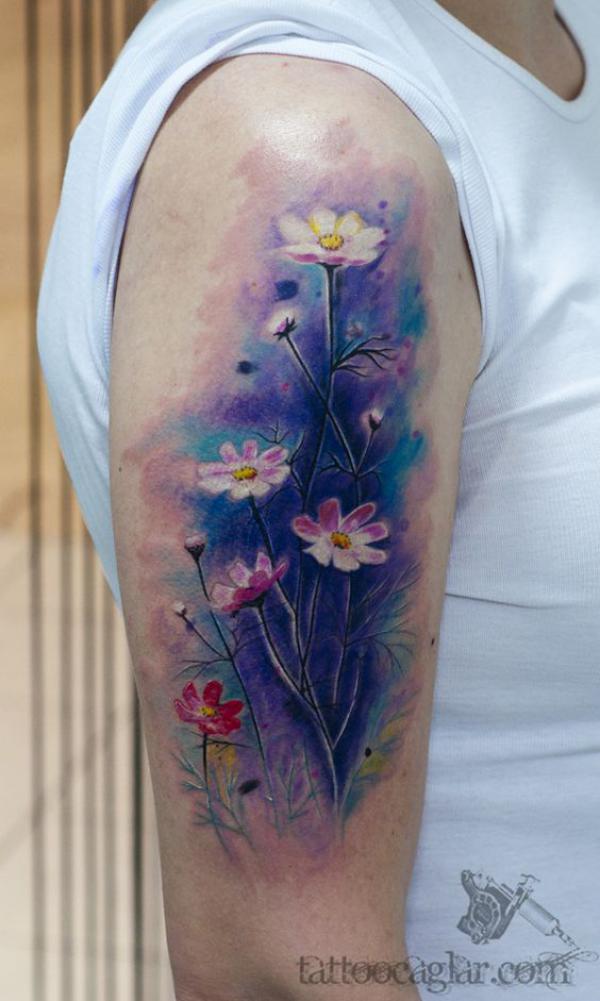 Daisy watercolor tattoo