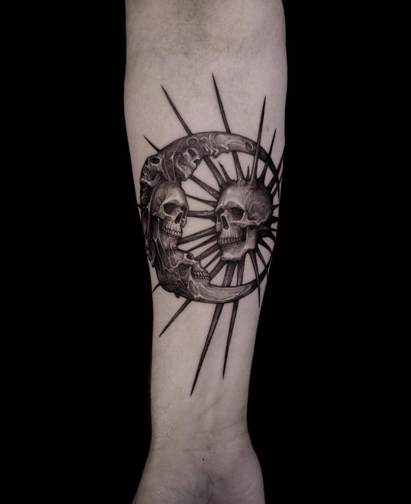 Dark Sun and moon skull tattoo