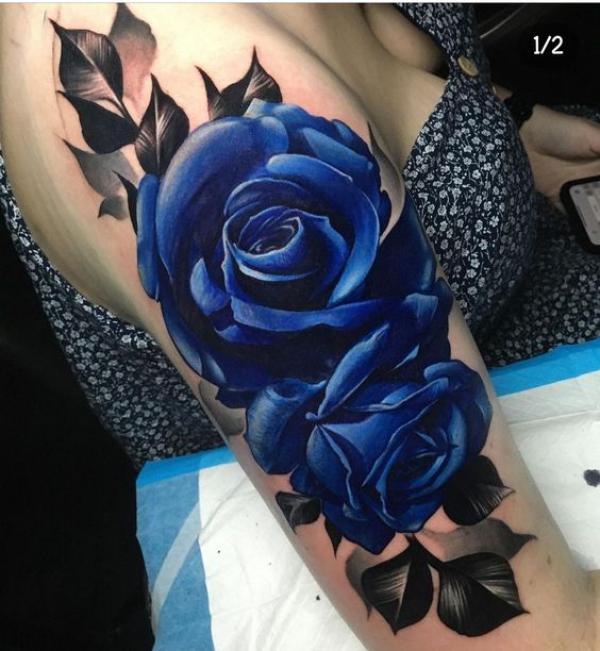 Deep blue roses half sleeve tattoo