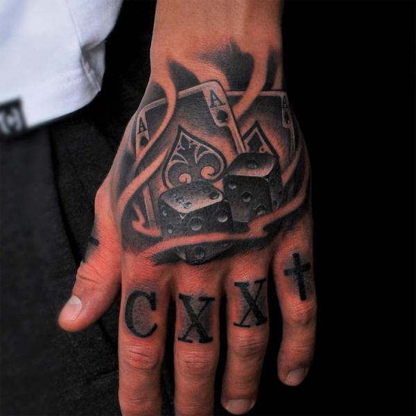 Dice and Ace of spades tattoo hand