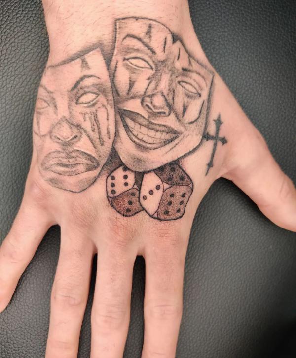 Dice and laugh now cry later tattoo hand