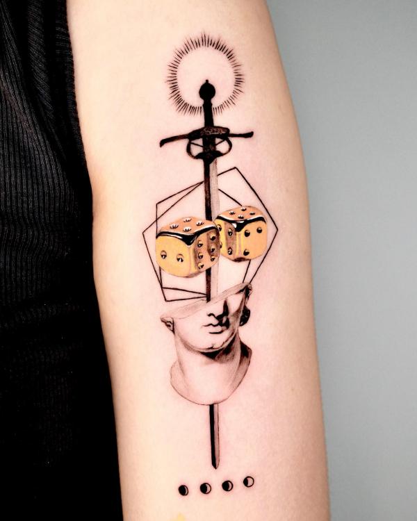 Dice sword with sun and moon phases tattoo