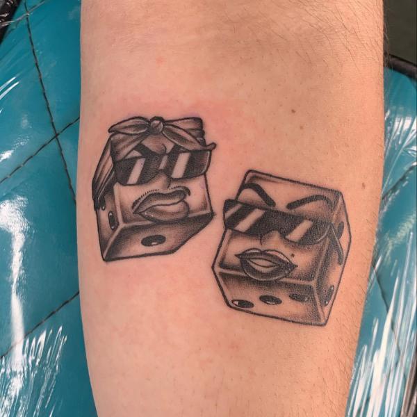 Dice with glasses tattoo