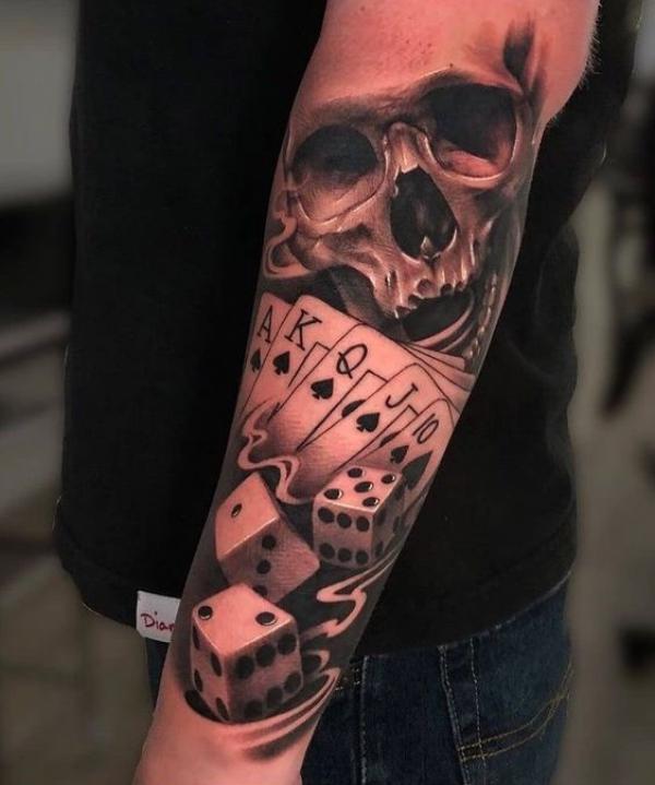 Dices cards and skull tattoo