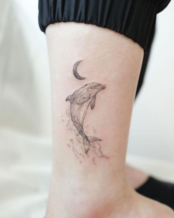 Dolphin-with-a-Crescent-Moon-Tattoo