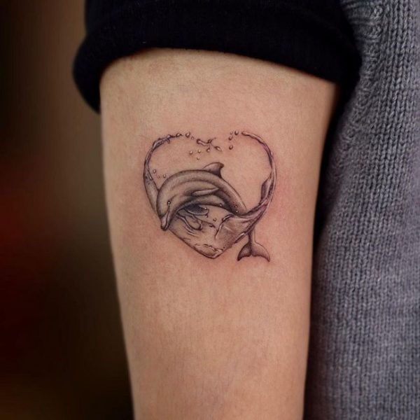 Dolphin-with-a-Heart-Shaped-Wave-Tattoo