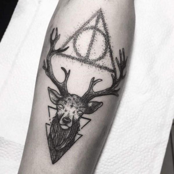 Dotwork deathly hallows and patronus stag tattoo