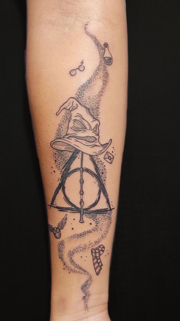 Dotwork deathly hallows with Sorting Hat forearm tattoo