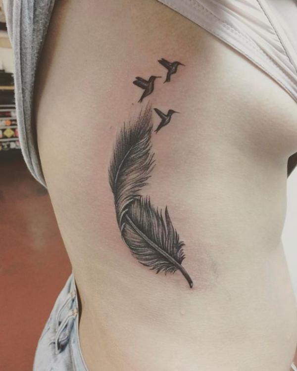 Feather and birds side boob tattoo