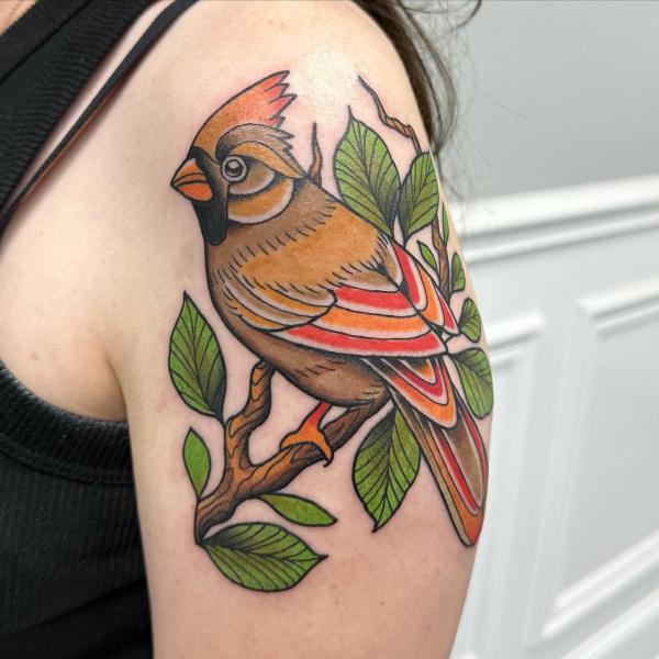 Female cardinal upper arm tattoo 1