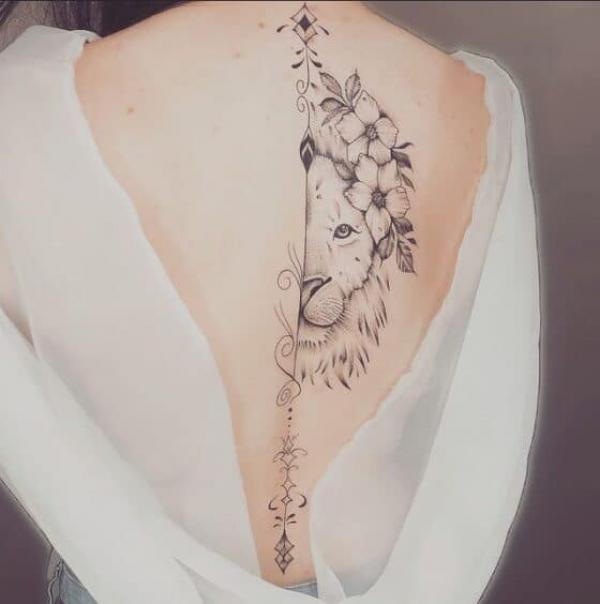 Feminine Leo lioness back tattoo